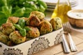 Fried crispy zucchini balls with feta cheese- vegetarian food. Royalty Free Stock Photo