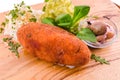 Fried cutlet, mashed potatoes, sauerkraut and pickled mushrooms on a wooden board Royalty Free Stock Photo