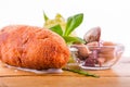 Fried cutlet, mashed potatoes, sauerkraut and pickled mushrooms on a wooden board Royalty Free Stock Photo