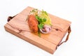 Fried cutlet, mashed potatoes, sauerkraut and pickled mushrooms on a wooden board on a white background Royalty Free Stock Photo