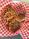 Fried Dough Dessert Rosette with Sea Salt Caramel Sauce / Turkish Demir Tatlisi Iron Dessert From Erzurum Royalty Free Stock Photo