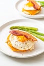 fried egg with bacon and cheese on pancake Royalty Free Stock Photo