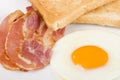 Fried egg, Bacon & Toast. Royalty Free Stock Photo