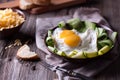 Fried egg and bread on wooden table Royalty Free Stock Photo