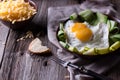 Fried egg and bread on wooden table Royalty Free Stock Photo