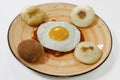 Fried egg  bulls eye with homemade baked beans with crispy bread Royalty Free Stock Photo