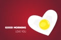 Fried egg Heart shape. Valentine`s Day concept Royalty Free Stock Photo