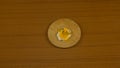 fried egg, with hen drawn, hard-boiled egg with yellow yolk coming out on the cutting board Royalty Free Stock Photo