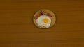 fried egg, with hen drawn, hard-boiled egg with yellow yolk coming out on the cutting board Royalty Free Stock Photo