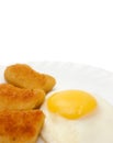 Fried egg and nuggets on plate copy space Royalty Free Stock Photo