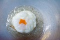 A fried egg with oil on pan. Royalty Free Stock Photo