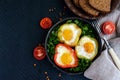 Fried egg in the ring of the bell peppers with herbs and brown bread - light diet breakfast. Royalty Free Stock Photo