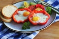 Fried egg in the ring of the bell peppers with herbs . Colorful healthy breakfast Royalty Free Stock Photo
