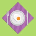 Fried egg on a round plate with a knife and fork Royalty Free Stock Photo