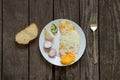 Fried egg salad and bread on the table for breakfast top to bottom view Royalty Free Stock Photo