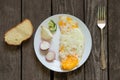 Fried egg salad and bread on the table for breakfast top to bottom view Royalty Free Stock Photo