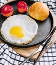 fried egg with salted red fish in a pan with coffee Royalty Free Stock Photo