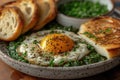 Fried egg on sauteed spinach and toast