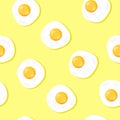 Fried egg seamless patterns on yellow background Royalty Free Stock Photo