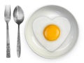 fried egg side up a plate with spoon and fork on a white background Royalty Free Stock Photo