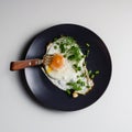 Fried egg with soft egg yolk, a bull that flows out by inserting a fork