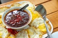 Fried egg and traditional Thai chili shrimp and pork paste on the wood table