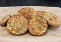 Fried eggplant slices on a cutting board.