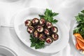 Fried eggplant slices stuffed with soft cheese and pomegranate on the table Royalty Free Stock Photo
