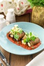 Fried eggplant slices stuffed with soft cheese and tomato sauce on the table Royalty Free Stock Photo