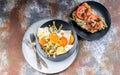 Fried eggs with asparagus, sandwich with pesto, tomatoes and mushrooms. Tasty breakfast. Top view Royalty Free Stock Photo