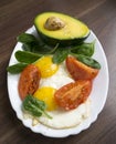 Fried eggs with avocad Royalty Free Stock Photo
