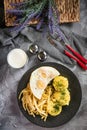 Fried eggs with boiled potatoes and yellow string beans. Royalty Free Stock Photo