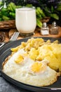 Fried eggs with boiled potatoes and yellow string beans Royalty Free Stock Photo