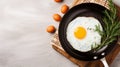 Fried eggs fried in a frying pan. A hot, appetizing dish that unmarried men and poor students eat for breakfast. Royalty Free Stock Photo