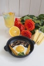 Fried eggs with mini corn and roses