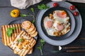 Fried eggs with mushrooms and toasts with cream cheese. Tasty breakfast. Top view Royalty Free Stock Photo