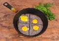 Fried eggs prepared by beating egg white with black olives Royalty Free Stock Photo