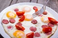 Fried eggs with sausage slices Royalty Free Stock Photo