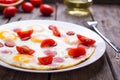 Fried eggs with sausage slices Royalty Free Stock Photo