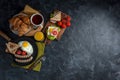 Fried eggs, sausages and vegetables on pan Royalty Free Stock Photo