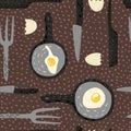 Fried eggs seamless pattern. Fried egg in pan with fork, knife and eggshell on dots background Royalty Free Stock Photo