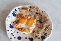 Fried eggs with sesame, served with sour dough toast Royalty Free Stock Photo