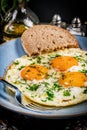 Fried eggs with a slice of bread