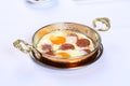 Fried eggs with sucuk on a pan Royalty Free Stock Photo