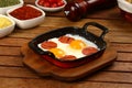 Fried eggs with sucuk on a pan Royalty Free Stock Photo