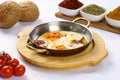 Fried eggs with sucuk on a pan Royalty Free Stock Photo