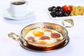 Fried eggs with sucuk on a pan Royalty Free Stock Photo