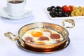 Fried eggs with sucuk on a pan Royalty Free Stock Photo