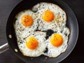 Fried eggs sunny side up in a cast iron skillet Royalty Free Stock Photo