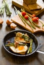 Fried eggs on a toasted bread in a metal pan. Royalty Free Stock Photo